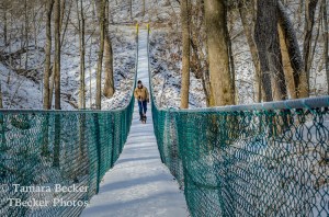 Bob and Molly on the swinging bridge at Oakland Mills State Park